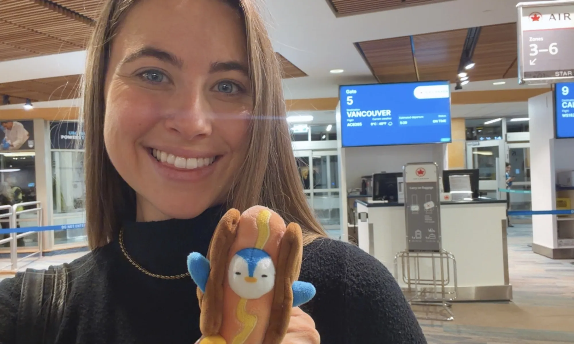 Lana at the airport heading to Vancouver